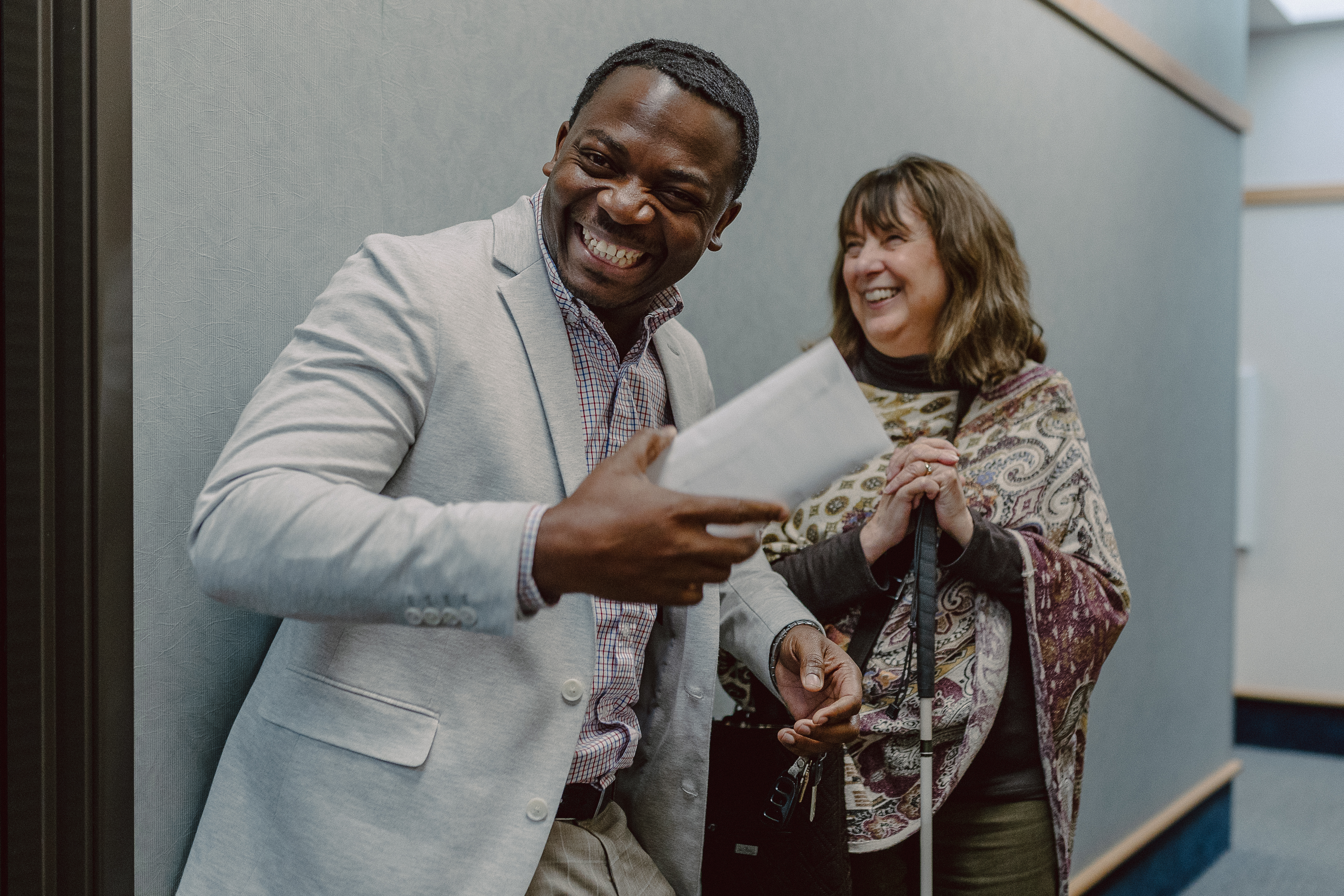 Two people sharing a joyful moment at Love Columbia
